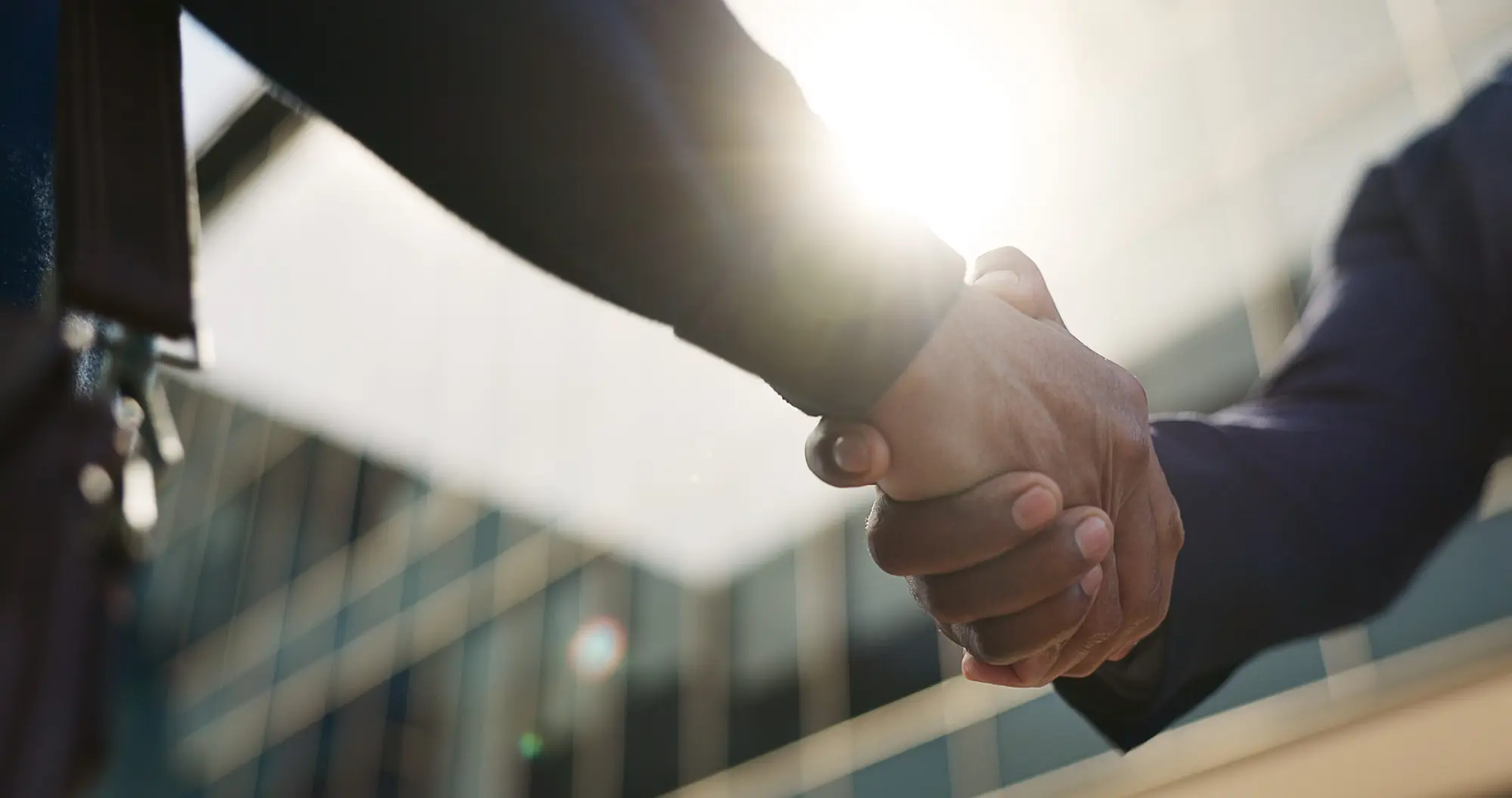 Two business partners shaking hands